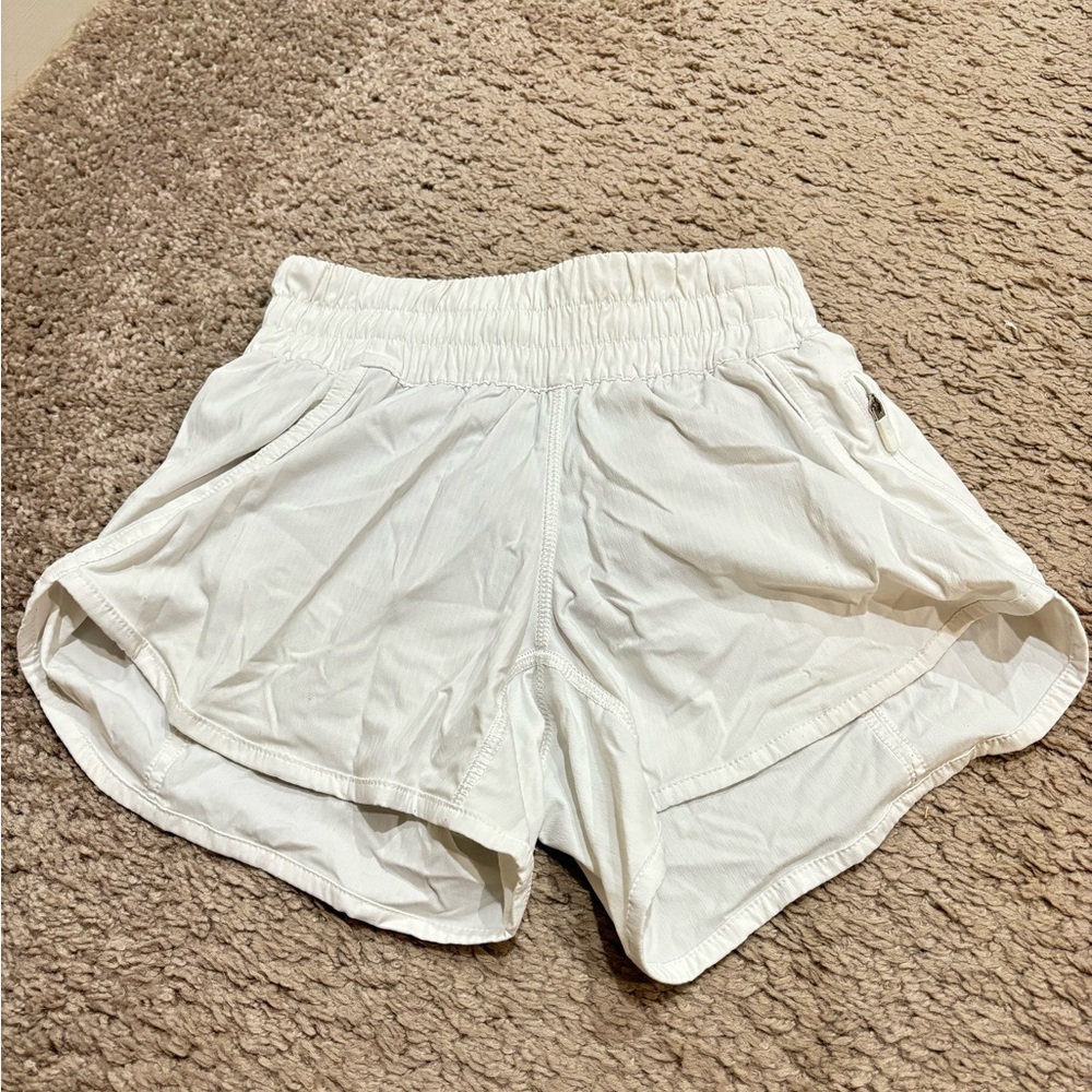 white lululemon tracker shorts